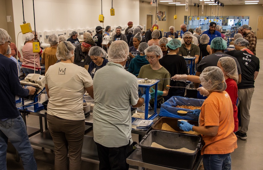 Packing meals at Tempe Grand Opening