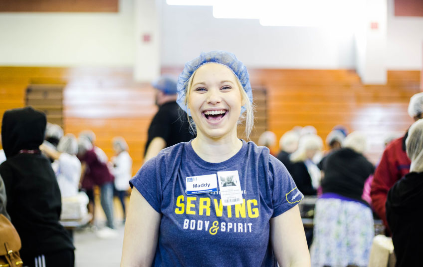 Volunteer smiling at MobilePack